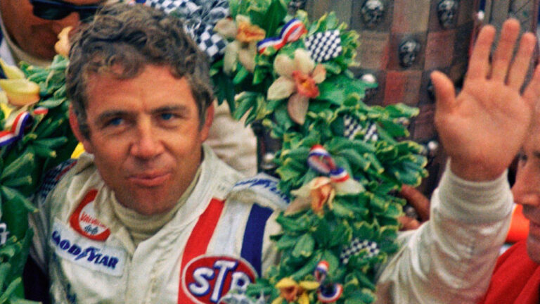 Gordon Johncock wears a wreath after winning the Indianapolis 500 auto race, May 30, 1973. (AP Photo)