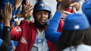 Toronto Blue Jays' Vladimir Guerrero Jr. is congratulated by his teammates after hitting a three-run home run off Cleveland Guardians starting pitcher Joey Cantillo during the second inning of a baseball game, Wednesday, Sep. 2, 2026, in Cleveland. (Phil Long/AP)