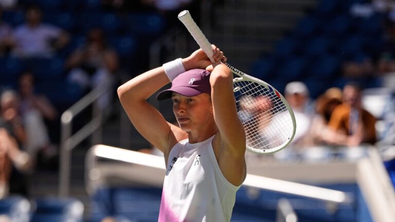 Iga Swiatek, of Poland, reacts during a match against Qinwen Zheng, of China, during the fourth round of the U.S. Open tennis championships, Monday, Sept. 7, 2026, in New York. (Seth Wenig/AP)