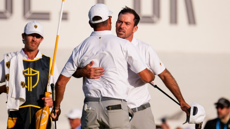 International teams' Nick Taylor, of Canada, right, celebrates with Corey Conners, of Canada, after their Presidents Cup golf tournament third round foursome match against the USA team at Medinah Country Club, Saturday, Sept. 26, 2026, in Medinah, Ill. (Matt Slocum/AP)