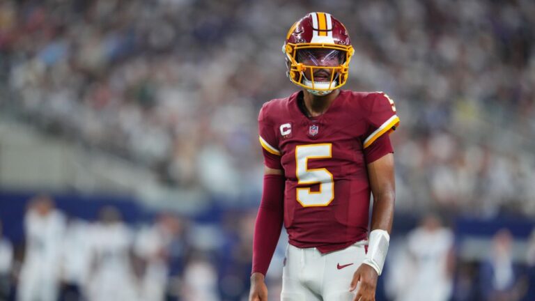 Washington Commanders quarterback Jayden Daniels (5) looks on during an NFL football game between the Dallas Cowboys and the Washington Commanders in Arlington, Texas, Sunday, Sept. 20, 2026. (Julio Cortez/AP)
