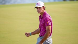 USA teams' Jackson Koivun reacts to his birdie putt on the 12th hole against the International team during a Presidents Cup golf tournament final round singles match at Medinah Country Club, Sunday, Sept. 27, 2026, in Medinah, Ill. (Matt Slocum/AP)