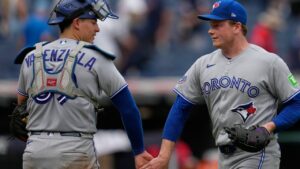 Toronto Blue Jays catcher Brandon Valenzuela, left, and relief pitcher Louis Varland, right, celebrate after the Blue Jays defeated the Cleveland Guardians in a baseball game in Cleveland, Thursday, Sept. 3, 2026. (Sue Ogrocki/AP)