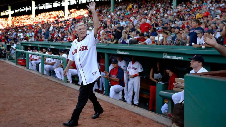 Former Boston Red Sox manager Joe Morgan waves to fans as he is honored prior to a baseball game between the Red Sox and the Seattle Mariners at Fenway Park in Boston on Tuesday, July 30, 2013. (Elise Amendola/AP)