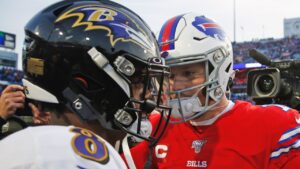 FILE - Buffalo Bills quarterback Josh Allen talks with Baltimore Ravens quarterback Lamar Jackson following a 24-17 Ravens win in an NFL game in Orchard Park, N.Y., in this Sunday, Dec. 8, 2019, file photo. (AP/John Munson, File)