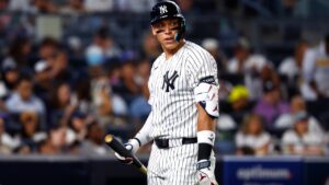 New York Yankees' Aaron Judge walks to the dugout after striking out during the sixth inning of a baseball game against the Colorado Rockies, Tuesday, Sept. 8, 2026, in New York. (AP Photo/Noah K. Murray)