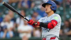 Toronto Blue Jays' Kazuma Okamoto watches his solo home run during the second inning of a baseball game against the Athletics Tuesday, Sept. 8, 2026, in West Sacramento, Calif. (AP Photo/Scott Marshall)