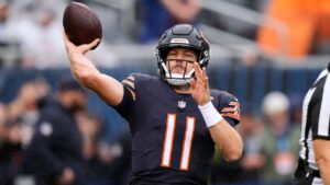 Chicago Bears quarterback Case Keenum warms up before an NFL football game against the Minnesota Vikings in Chicago, Sunday, Sept. 20, 2026. (AP Photo/Nam Y. Huh)