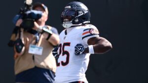 Chicago Bears running back Kyle Monangai celebrates after scoring a touchdown during the second half of an NFL game, Sunday, Sept. 13, 2026, in Charlotte, N.C. (AP/Scott Kinser)