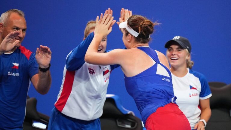 Czech Republic's Linda Noskova , centre right, and Czech Republic's Karolina Muchova high five after they won their women's singles semifinal matches against Spain's Cristina Bucsa and Spain's Jessica Bouzas Maneiro, respectively, in Shenzhen, China, Friday, Sept. 25, 2026. (Andy Wong/AP)