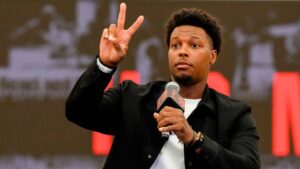 Kyle Lowry speaks at a press conference as he signs a one-day contract to retire as a Toronto Raptor, in Toronto, on Tuesday, July 7, 2026. (Chris Young/CP)