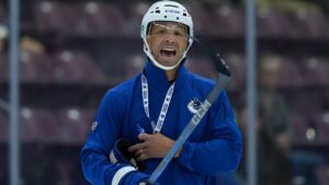 Vancouver Canucks head coach Manny Malhotra calls out instructions to players during the opening day of the NHL hockey team's training camp, in Penticton, B.C., on Thursday, Sept. 17, 2026. THE CANADIAN PRESS/Darryl Dyck