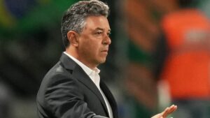 Coach Marcelo Gallardo of Argentina's River Plate gestures during a Copa Libertadores quarterfinal second leg soccer match against Brazil's Palmeiras at Allianz Parque stadium in Sao Paulo, Wednesday, Sept. 24, 2025. (AP Photo/Andre Penner)