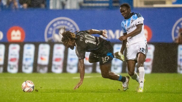 CF Montreal's Victor Loturi (22) and Charlotte FC's Allan Saint-Maximin (10) vie for possession of the ball during first half MLS soccer action, in Montreal, on Wednesday, Sept. 9, 2026. (Christopher Katsarov/CP)