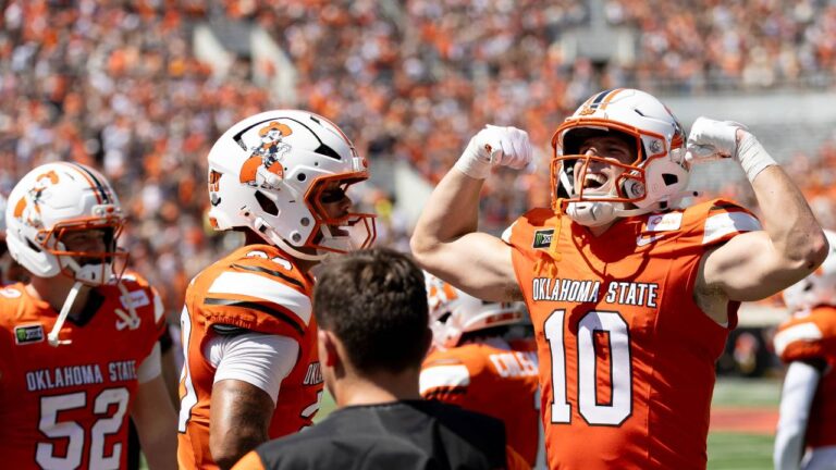 Oklahoma State wide receiver Wyatt Young (10) celebrates towards the fans after scoring a touchdown in the first half of the NCAA college football game against Oregon in Stillwater, Okla., Saturday, Sept. 12, 2026. (Mitch Alcala/AP)