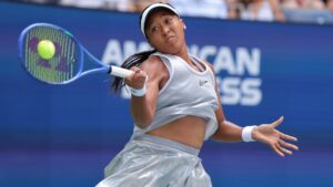 Naomi Osaka, of Japan, returns the ball to Katerina Siniakova, of the Czech Republic, during the second round of the U.S. Open tennis championships Thursday, Sept. 3, 2026, in New York. (AP Photo/Andres Kudacki)