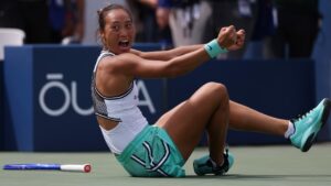 Zheng Qinwen, of China, celebrates after she won her match against Madison Keys, of the United States, during the third round of the U.S. Open tennis championships Saturday, Sept. 5, 2026, in New York. (AP Photo/Heather Khalifa)