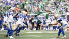 Stevens scores three touchdowns as Roughriders beat Blue Bombers in OT thriller