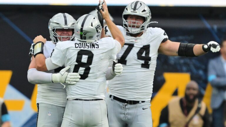 Las Vegas Raiders quarterback Kirk Cousins (8) celebrates with teammates after throwing a touchdown pass to wide receiver Cody White during the second half of an NFL football game against the Los Angeles Chargers in Inglewood, Calif., Sunday, Sept. 20, 2026. (AP Photo/Jayne Kamin-Oncea)