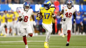 Los Angeles Rams wide receiver Davante Adams (17) runs after a catch during the first half of an NFL football game against the New York Giants in Inglewood, Calif., Monday, Sept. 21, 2026. (AP Photo/Caroline Brehman )