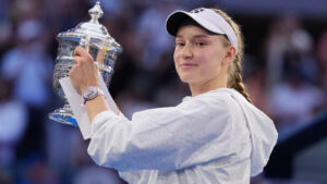 Elena Rybakina, of Kazakhstan, holds the trophy after she won the women's singles final of the US Open tennis championships against Aryna Sabalenka, of Belarus, Saturday, Sept. 12, 2026, in New York. (Kirsty Wigglesworth/AP)