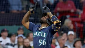 Seattle Mariners' Randy Arozarena gestures after hitting a home run during the second inning of a baseball game against the Boston Red Sox, Tuesday, Sept. 1, 2026, in Boston. (Mark Stockwell/AP)