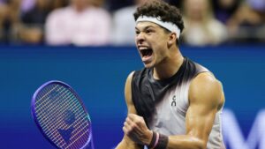 Ben Shelton, of the United States, celebrates after a point in the fifth set against Carlos Alcaraz, of Spain, during the quarterfinal round of the U.S. Open tennis championships, early Wednesday, Sept. 9, 2026, in New York. (AP Photo/Adam Hunger)