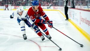 Montreal Canadiens' Juraj Slafkovsky (20) moves the puck during NHL pre-season hockey action against the Toronto Maple Leafs in Montreal, on Saturday, Sept. 19, 2026. (Christopher Katsarov/CP)