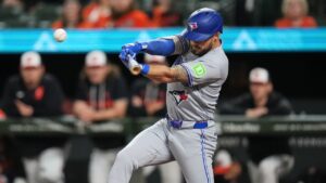 Toronto Blue Jays' Nathan Lukes hits an RBI single during the first inning of a baseball game against the Baltimore Orioles, Monday, Sept. 21, 2026, in Baltimore. (Stephanie Scarbrough/AP)