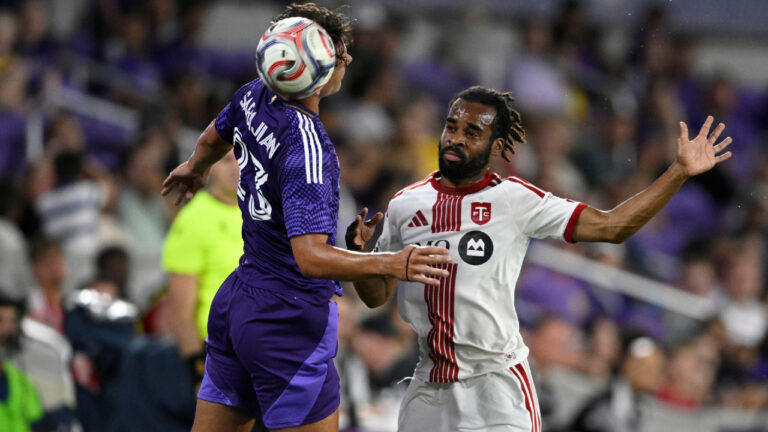 Orlando City forward Harvey Sarajian (23) and Toronto FC defender Raheem Edwards (44) compete for the ball during the second half of an MLS soccer match, Saturday, Sept. 12, 2026, in Orlando, Fla. (Phelan M. Ebenhack/AP)