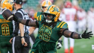 Edmonton Elks' Nick Anderson (48) celebrates a turnover against the Calgary Stampeders during first half CFL football action in Edmonton on Saturday, Sept. 12, 2026. THE CANADIAN PRESS/Codie McLachlan