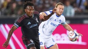 Colorado Rapids midfielder Hamzat Ojediran, left, and CF Montréal midfielder Samuel Piette pursue the ball in the first half of an MLS soccer match Saturday, Sept. 12, 2026, in Dick's Sporting Goods Park in Commerce City, Colo. (AP Photo/David Zalubowski)