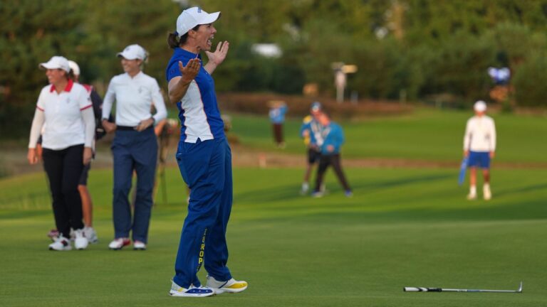 Carlota Ciganda of Europe reacts after holing a putt on the 18th green during the Solheim Cup in Den Bosch, Netherlands, Friday, Sept. 11, 2026. (AP Photo/Alastair Grant)