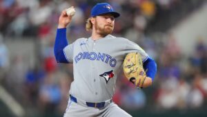 Toronto Blue Jays starting pitcher Spencer Miles throws during the first inning of a baseball game against the Texas Rangers, Sunday, Sept. 20, 2026, in Arlington, Texas. (AP Photo/LM Otero)