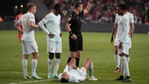 France's Kylian Mbappe lieas on the ground after he scored and injured himself during the UEFA Nations League soccer match between Turkey and France in Izmit, Turkey, Friday, Sept. 25, 2026. (AP Photo/Khalil Hamra)