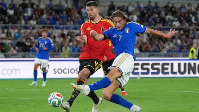 Italy's Pio Esposito, right, attempts a shot at goal next to Belgium's Brandon Mechele during the Nations League soccer match between Italy and Belgium in Rome, Friday, Sept. 25, 2026. (AP Photo/Andrew Medichini)