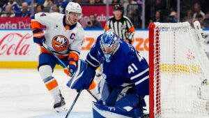 Toronto Maple Leafs goaltender Anthony Stolarz (41) makes a save as New York Islanders' Bo Horvat (14) looks for the rebound during first period NHL hockey action in Toronto on Wednesday, Sept. 30, 2026. THE CANADIAN PRESS/Frank Gunn