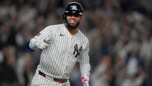 New York Yankees' Luis García Jr. runs the bases after hitting a solo home run against the Boston Red Sox during the fourth inning in Game 2 of baseball's American League Wild Card Series, Wednesday, Sept. 30, 2026, in New York. (AP Photo/Yuki Iwamura)
