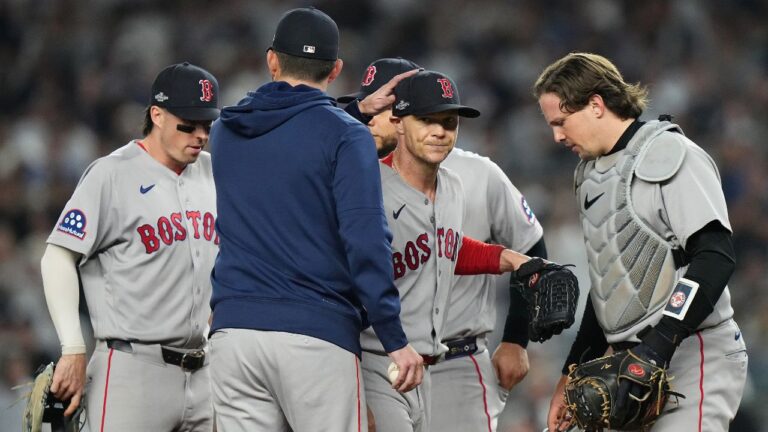 Boston Red Sox starting pitcher Sonny Gray, center facing, is pulled from the game against the New York Yankees during the fifth inning in Game 2 of baseball's American League Wild Card Series, Wednesday, Sept. 30, 2026, in New York. (AP Photo/Frank Franklin II)