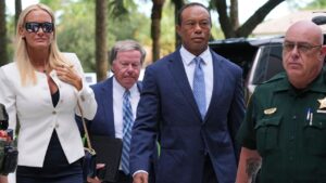 Golfer Tiger Woods, second from right, arrives with Vanessa Trump, left, for Woods' plea conference hearing in a DUI case stemming from a rollover crash in Florida in March, Wed., Sept. 2, 2026, in Stuart, Fla. (Lynne Sladky/AP)
