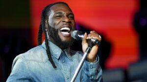 Burna Boy performs during the Glastonbury Festival in Worthy Farm, Somerset, England, Sunday, June 30, 2024. (Scott A Garfitt/Invision/AP)