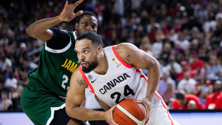 Jamaica’s Tyran De Lattibeaudiere (23) defends against Canada’s Dillon Brooks (24) during FIBA world cup qualification action in Hamilton, Monday, July 6, 2026. (Nick Iwanyshyn/CP)