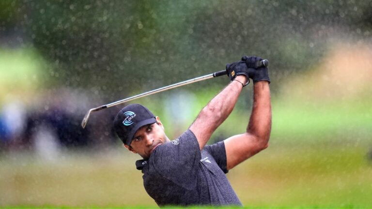 Aaron Rai of England chips from a bunker on day one of the 2026 BMW PGA Championship at Wentworth Golf Club, in Virginia Water, Surrey, England, Thursday Sept. 17, 2026. (Adam Davy/AP)