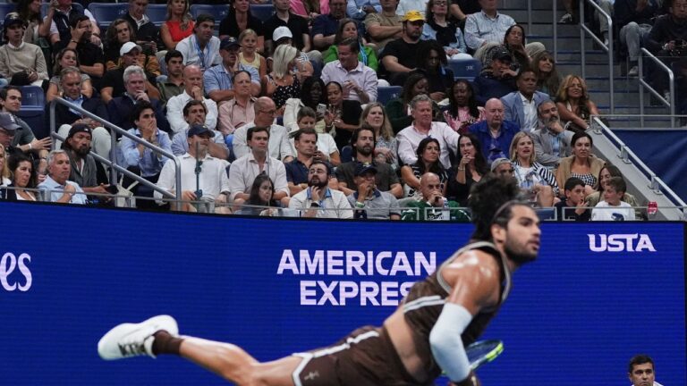 Fans watch as Carlos Alcaraz, of Spain, serves to Jaime Faria, of Portugal, during the second round of the U.S. Open, Wednesday, Sept. 2, 2026, in New York. (Sydney Schaefer/AP)