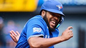 Toronto Blue Jays' Vladimir Guerrero Jr. (27) sprints in to score on a single by Alejandro Kirk (30), not shown, during first inning MLB baseball action against the Baltimore Orioles in Toronto, on Saturday, Sept. 12, 2026. (Sammy Kogan/CP)