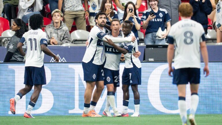 Vancouver Whitecaps' Ryan Gauld (25) celebrates his goal against the Los Angeles Galaxy with Brian White, second left, and Cheick Sabaly (7) during the second half of an MLS soccer match in Vancouver on Wednesday, Sept. 9, 2026. (Ethan Cairns/CP)