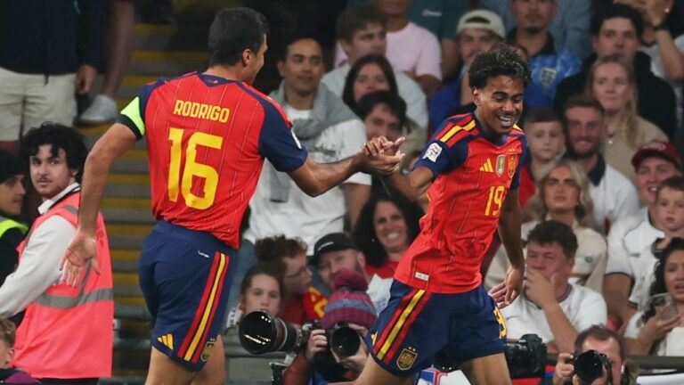 Spain's Lamine Yamal, right, celebrates after scoring the opening goal during the Nations League Soccer match between England and Spain in London, Saturday, Sept. 26, 2026. (AP Photo/Ian Walton)