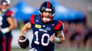 Montreal Alouettes quarterback Davis Alexander (10) runs the ball against the Ottawa Redblacks during first half CFL football action in Montreal, on Thursday, August 20, 2026. (Christopher Katsarov/THE CANADIAN PRESS)
