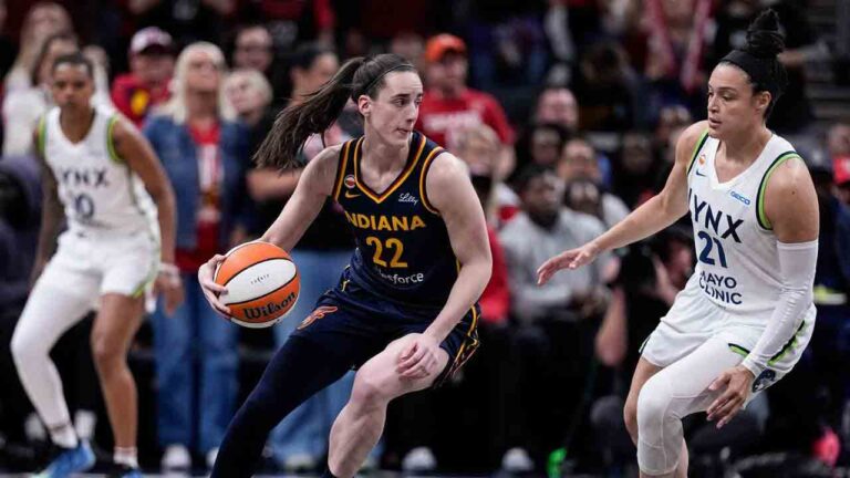 Minnesota Lynx guard Kayla McBride (21) defends Indiana Fever guard Caitlin Clark (22) in the first half of a WNBA basketball game in Indianapolis, Tuesday, Sept. 22, 2026. (Michael Conroy/AP)
