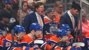 Edmonton Oilers head coach Mike Babcock shouts instructions to players against the Vancouver Canucks during first period NHL hockey action in Edmonton on Tuesday, Sept. 29, 2026. (Codie McLachlan/THE CANADIAN PRESS)